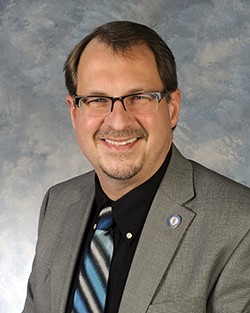 A portrait of Russell Webber